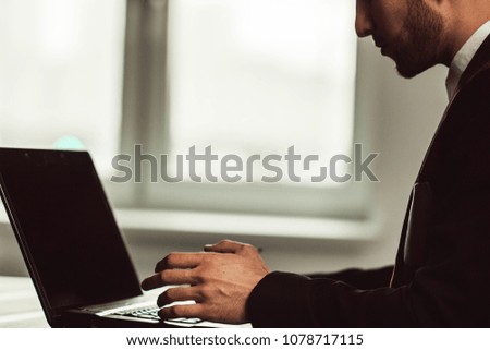 businessman working on laptop.