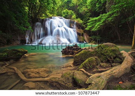 waterfall in deep forest of Thailand Royalty-Free Stock Photo #107873447