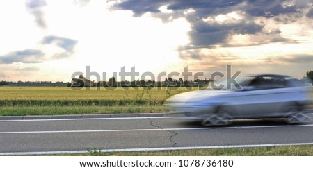 car moving on empty road. travel concept, travel alone, travel by car