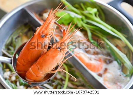 Focus at shrimps on hot pot. 