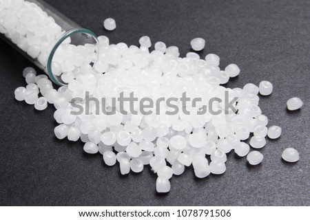 Plastic pellets. Transparent Polyethylene granules. Plastic Raw material .High Density Polyethylene (PE-HD).  PE-LD Royalty-Free Stock Photo #1078791506