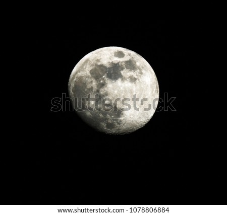 full moon up close in a black night sky