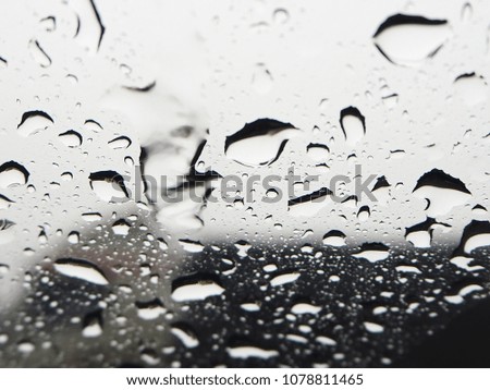 Raindrop outside car mirror,rainy day