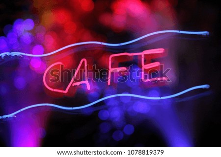 Vintage Neon Cafe Sign with Bokeh