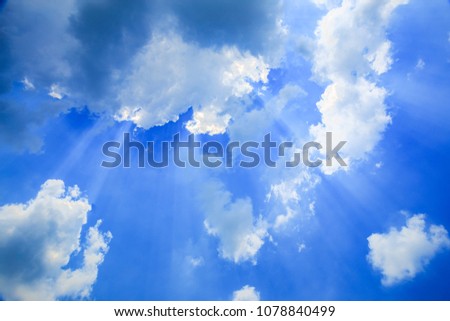 Sunbeam Shine through the cloud on the blue sky