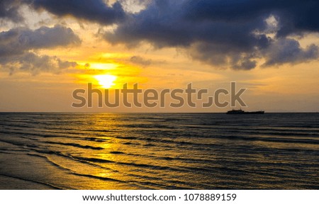 Sunrise or sunset at the beach for background texture.Tropical and summer concept.