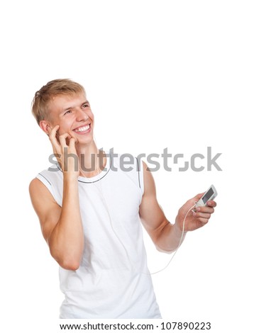 Smiling handsome young guy listening to music songs mp3 player, man wear white t shirt looking up empty copy space, concept boy advertisement product music store, isolated over white background