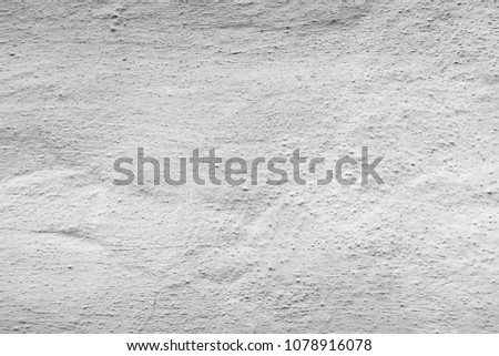 old concrete wall of white grunge plaster