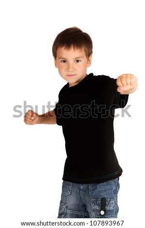 Teenager preparing for a fight, isolated on white