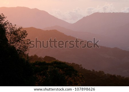 Sunset View over Coffee Plantations in a Costa Rica Valley. From Mirador de Quetzales, Costa Rica, Central America. Royalty-Free Stock Photo #107898626