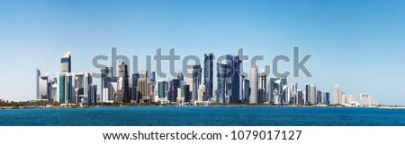 The morning panoramic view of the skyscrapers of Doha from the Persian Gulf. Futuristic skyline in the financial district of Qatar Royalty-Free Stock Photo #1079017127