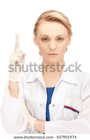 attractive female doctor with her finger up