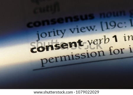 consent word in a dictionary. consent concept Royalty-Free Stock Photo #1079022029