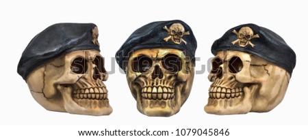 Old mask skull of a pirate in the captain cap on White background