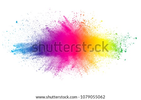 Multi color powder explosion on white background. Launched colorful dust particles splashing. Royalty-Free Stock Photo #1079055062