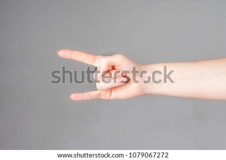 Hand drawn hand gesture rock goat. Hands with rock fingers up. Informal hand emotions. Isolated over white background. Alpha.