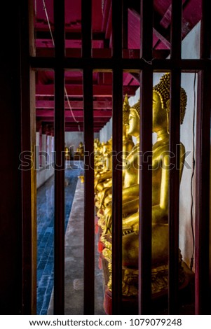 buddha at window frame