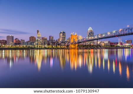 Cincinnati, Ohio, USA skyline on the river at dusk.