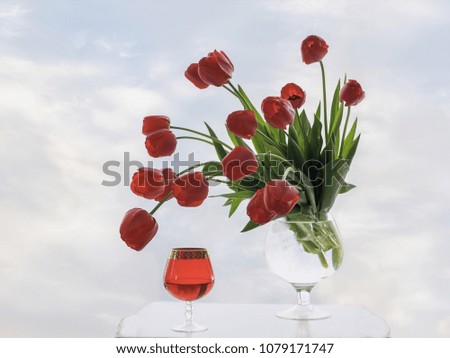 Still life with bouquet of red tulips