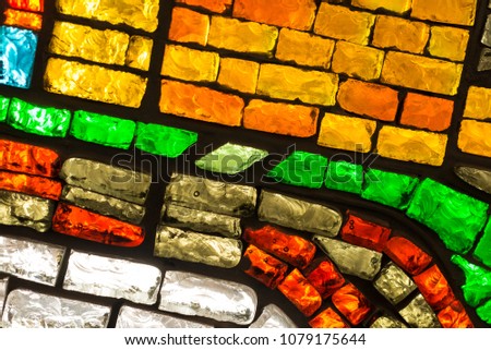 Texture in the form of glass bricks of different colors: blue, green, light blue, yellow, red, white, purple, brown, black, turquoise.