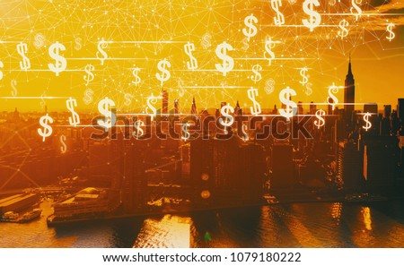 Dollars with the Manhattan, NY skyline in sunset