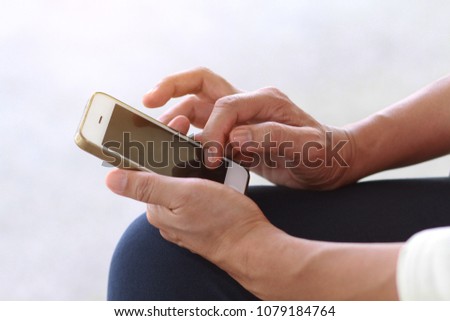 Hand people holding and play mobile phone 