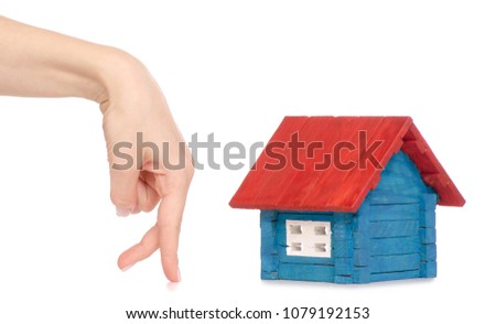 Wooden house small color hand finger on white background isolation