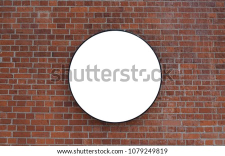 brick wall with a large circle for inscription, advertising