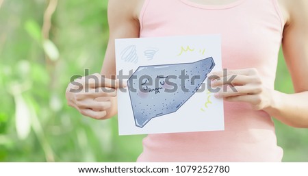 woman take cirrhosis liver billboard with green background