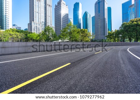 modern office building with asphalt road in shanghai china
