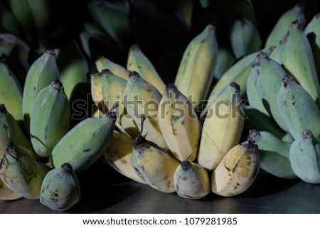Raw and ripe of banana bunch