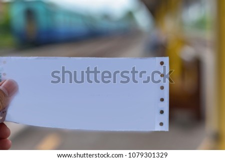 White paper with background blurred
