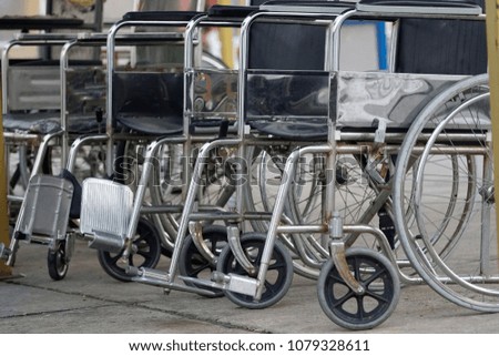 Empty wheelchair in the patient waiting point in hospital