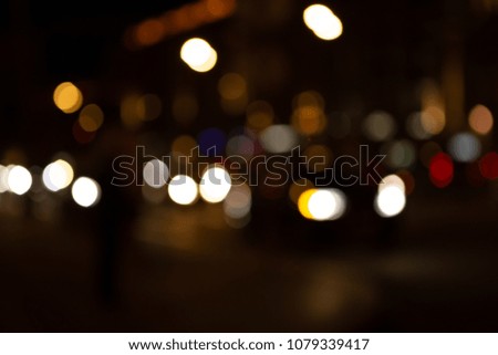 Night City Lifestyle Blurry Background. Blurry Bokeh In Night Short For Abstract Background.