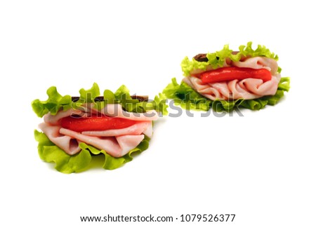 Sandwich with salmonÐ± salad and ham on white background