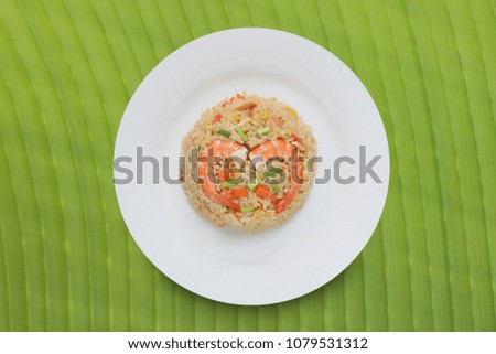 Fried rice with shrimp on banana leaf.Thai style call "Khao Pad Koong".The popular dishes at Thai street food