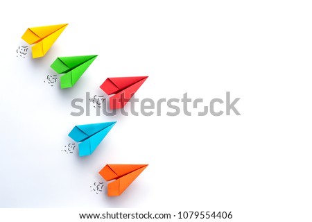 Paper plane on white background. Business competition concept. Royalty-Free Stock Photo #1079554406