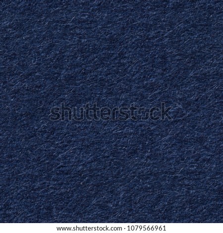 Saturated dark blue paper texture. Seamless square background, tile ready. High resolution photo.