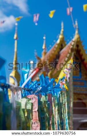 Thai Baht is on Blue Sky, in the Temple fair, Thailand