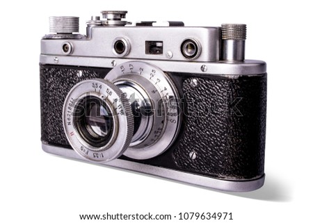 Old film 35 mm compact camera on white background, isolated.