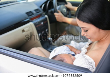 Travel Concepts. Family is driving on the road. Family drive safely with caution. Parents care baby in the car.