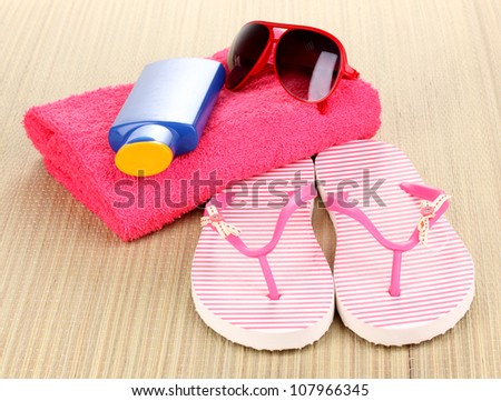 Beach accessories on mat