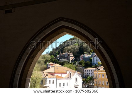 Worms eye view of the impressive Palace da Pena over the hill in Sintra, Lisbon. Portugal. summer spring. Window view