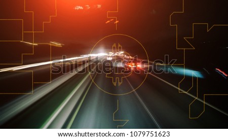 The golden Bitcoin on a night road with speed traffic light trails abstract background.