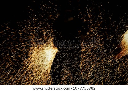 Fire Show In The Park. Evening Entertainment. Nightlife in the City. Beautiful Abstract Background.
