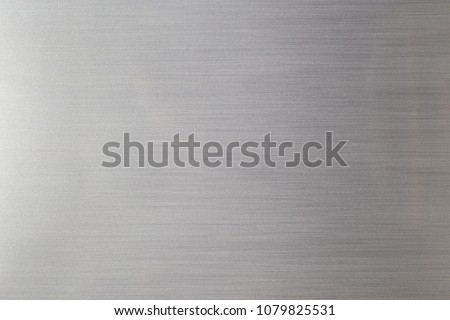 Refrigerator door, silver metallic background.