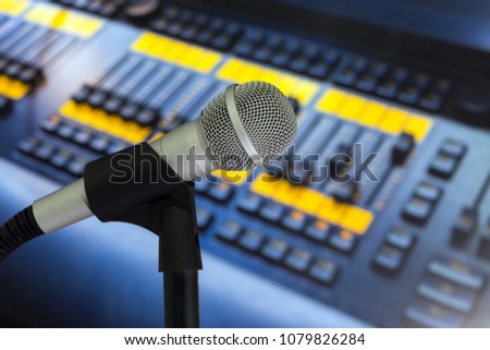 microphone on the  professional mixing console background 