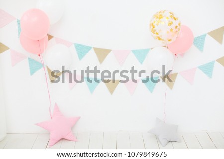 Children room. First birthday party for little girl princess. White interior. balloons and garland in white room. Birthday party for baby. Kinder room. Stylish kid room with decoration Royalty-Free Stock Photo #1079849675