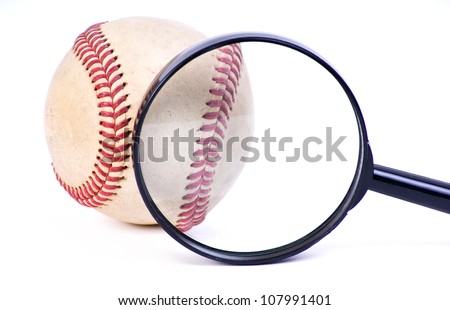 baseball ball with magnifying glass on white background