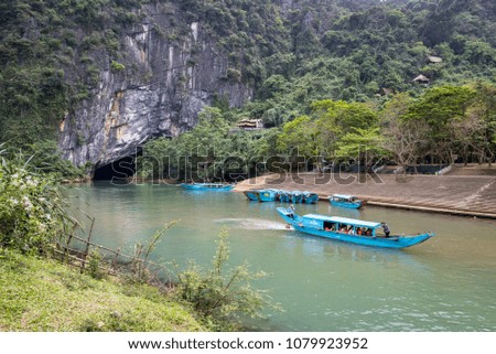 Boats leaving the cave